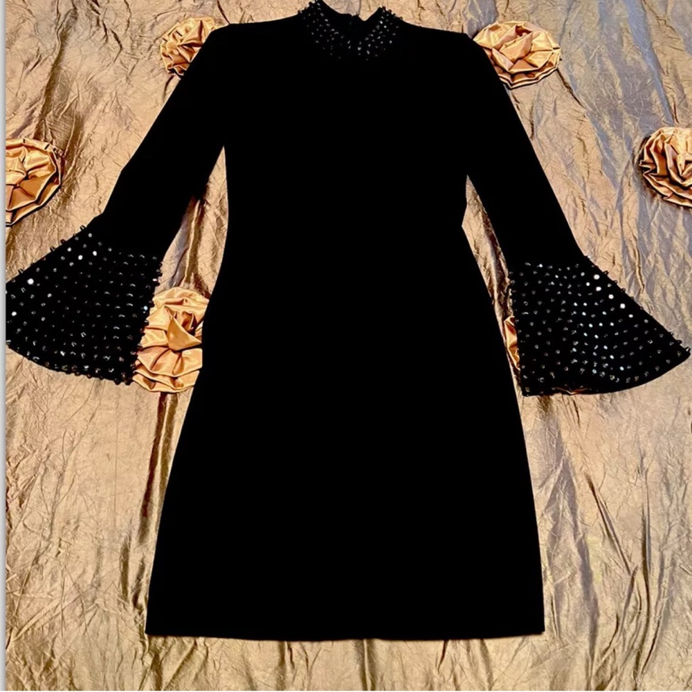 JOVANI Little black dress size 6 worn once Evening Metal Studs On Sleeves huggin